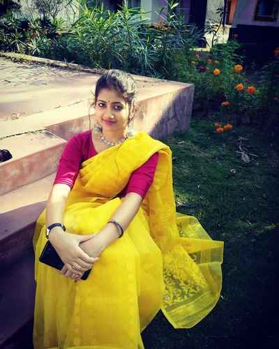 Actress Ratnapriya Das in yellow saree and purple blouse